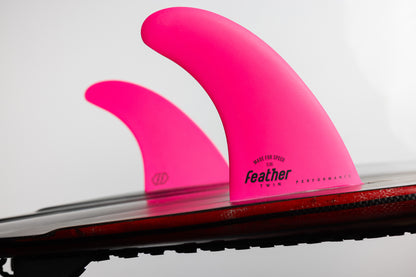 PERFORMANCE TWIN FIN FLUOR PINK.