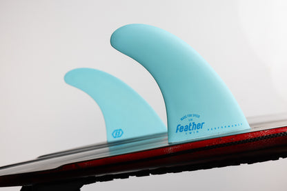 PERFORMANCE TWIN FIN TURQUOISE.
